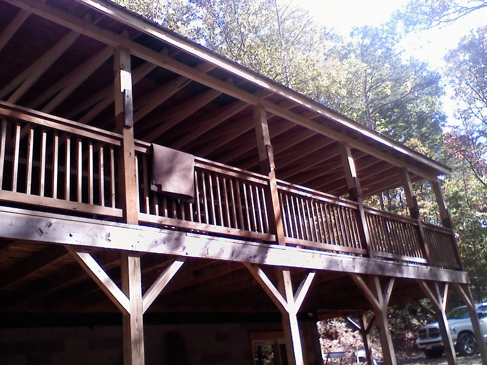 Timber framing under a new elevated porch and deck — Roof Leak Repair in Delevan by Roofing Brothers